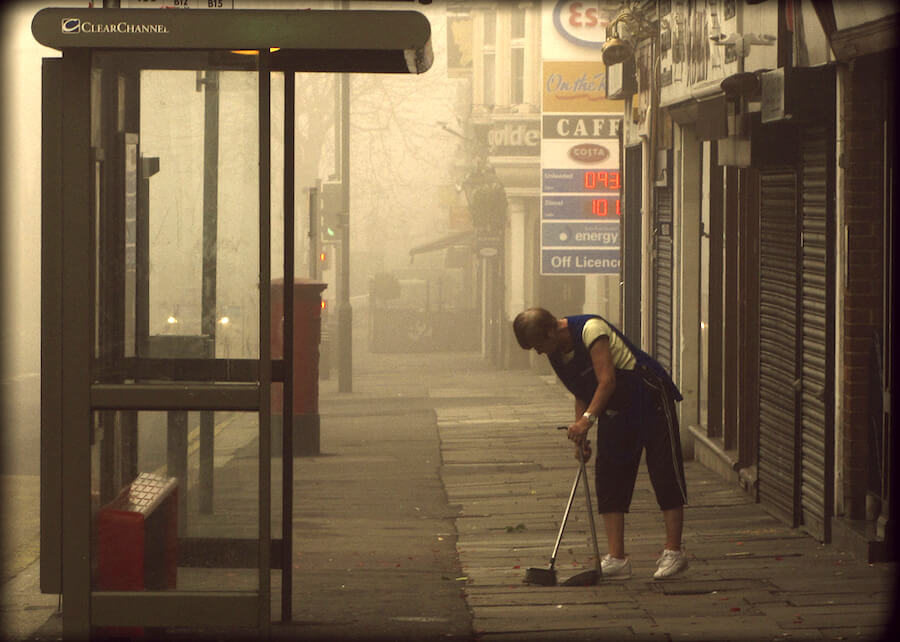 empty bus stop with cleaner